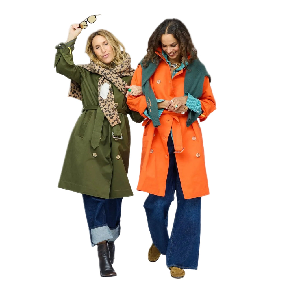 Kerri Rosenthal leopard print top styled with a coat, group shot with second model in orange coat
