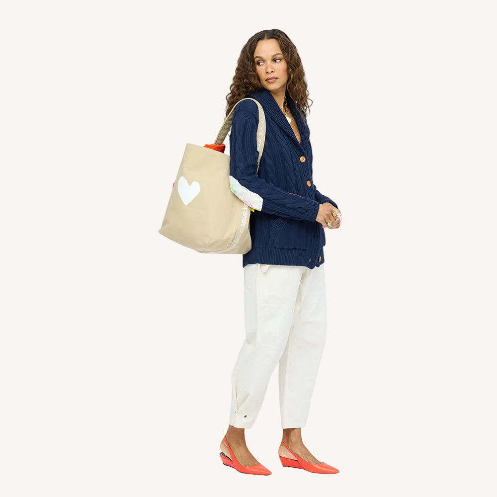 Helen shawl collar blue button-front cardigan in cotton cashmere blend with multi-color braided art and pockets , white Love Brigade pants and Imperfect Heart Hobo- Shop women’s cardigans by Kerri Rosenthal