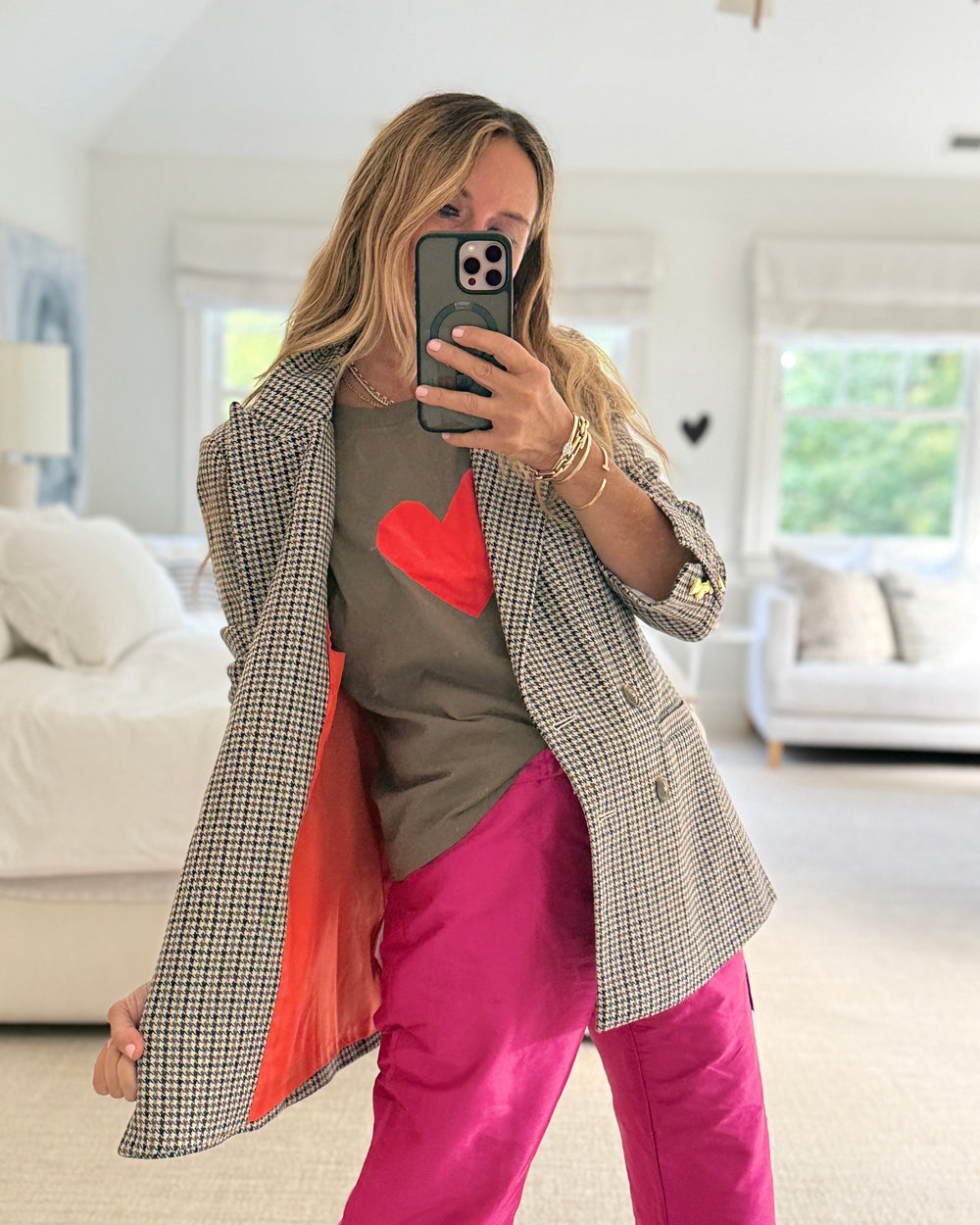 Kerri taking selfie, wearing Suke tee styled with Mr Frenchie houndstooth blazer.