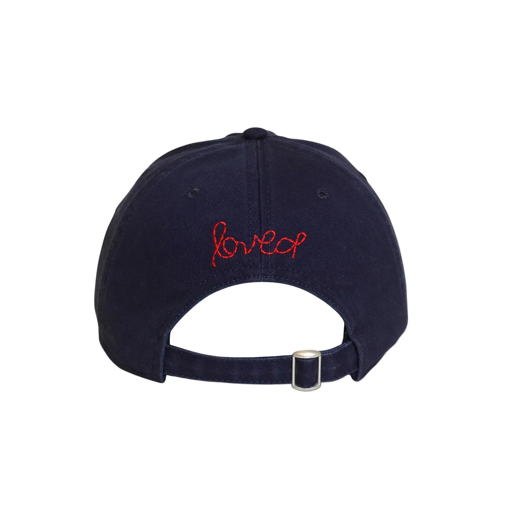 Unique navy blue cotton baseball cap hat with unique Imperfect heart patch and an adjustable belts
