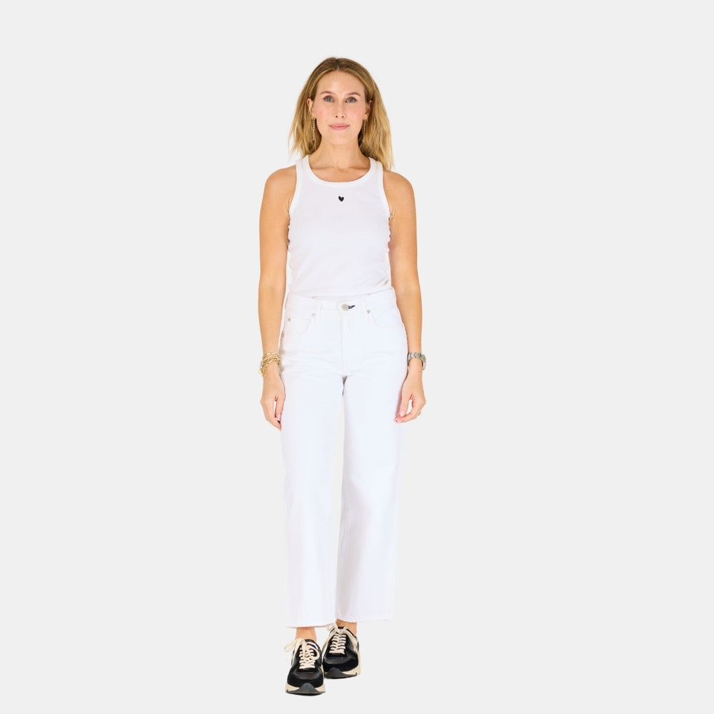 The KR white tank top is in a cotton blend with a tiny embroidered heart - Shop cute designer women’s tank tops by Kerri Rosenthal