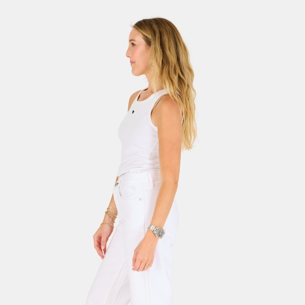 The KR white tank top is in a cotton blend with a tiny embroidered heart - Shop cute designer women’s tank tops by Kerri Rosenthal