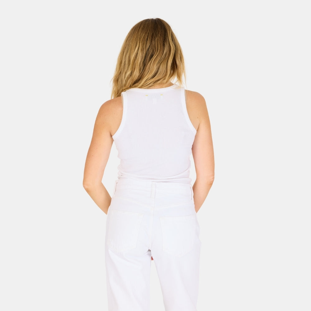 The KR white tank top is in a cotton blend with a tiny embroidered heart - Shop cute designer women’s tank tops by Kerri Rosenthal
