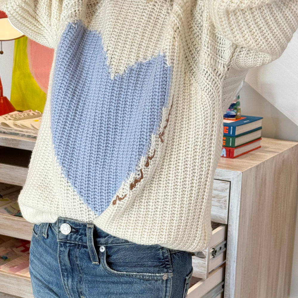 Ricki cream sweater in 100% ribbed cashmere with light blue heart artwork by Kerri Rosenthal