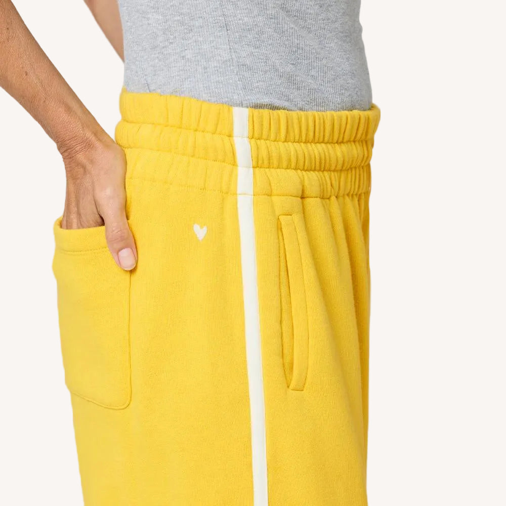 Weekend yellow palazzo sweatpant in 100% cotton fleece with a tiny heart and elastic waist by Kerri Rosenthal