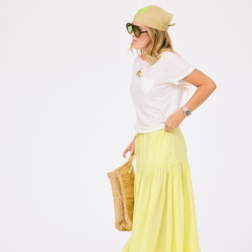 Slub white tee shirt with lime green long maxi skirt and beige cotton bandana by Kerri Rosenthal