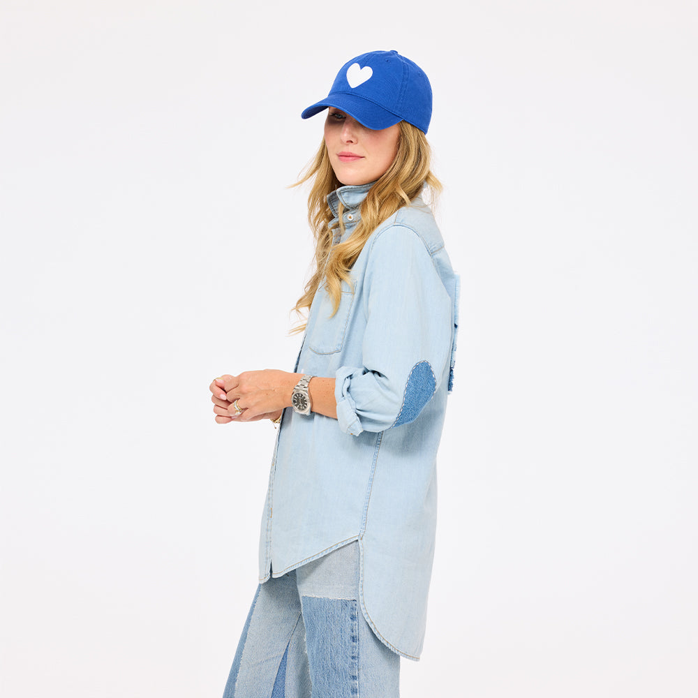 Side view of Denim shirt with imperfect heart elbow patche and blue american flag