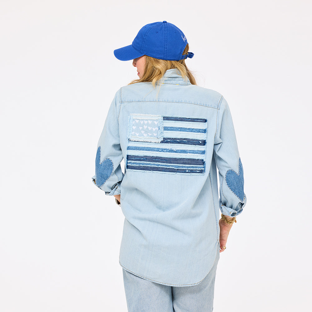 Denim shirt with imperfect heart elbow patche and blue american flag