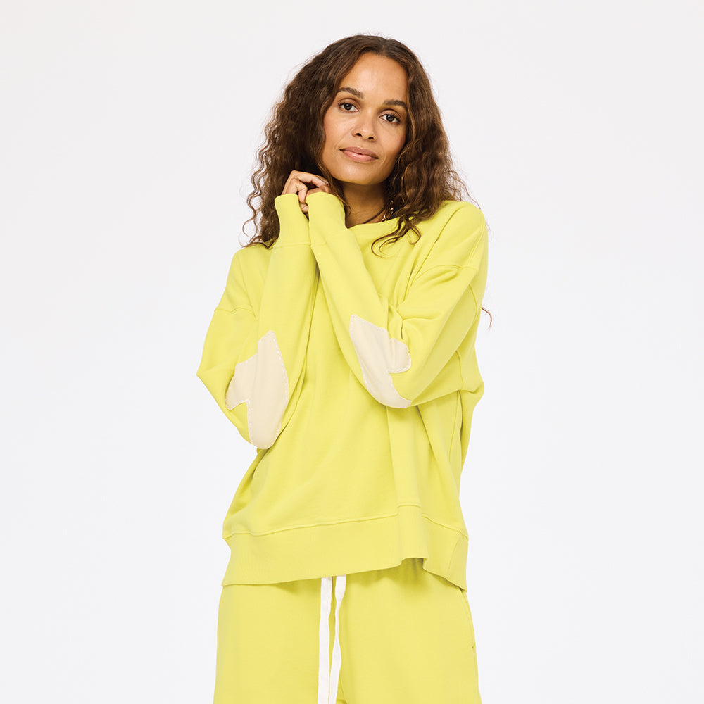 Lime green sweatshirt in cotton terry with heart elbow patches - Shop women’s heart sweatshirts by Kerri Rosenthal