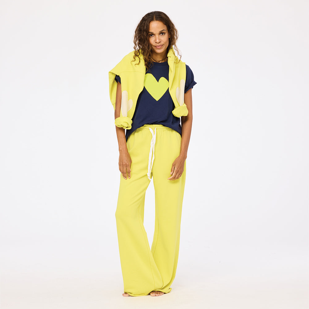 Weekend barb lime green sweatpants in 100% cotton with navy blue tee and lime green sweats by Kerri Rosenthal