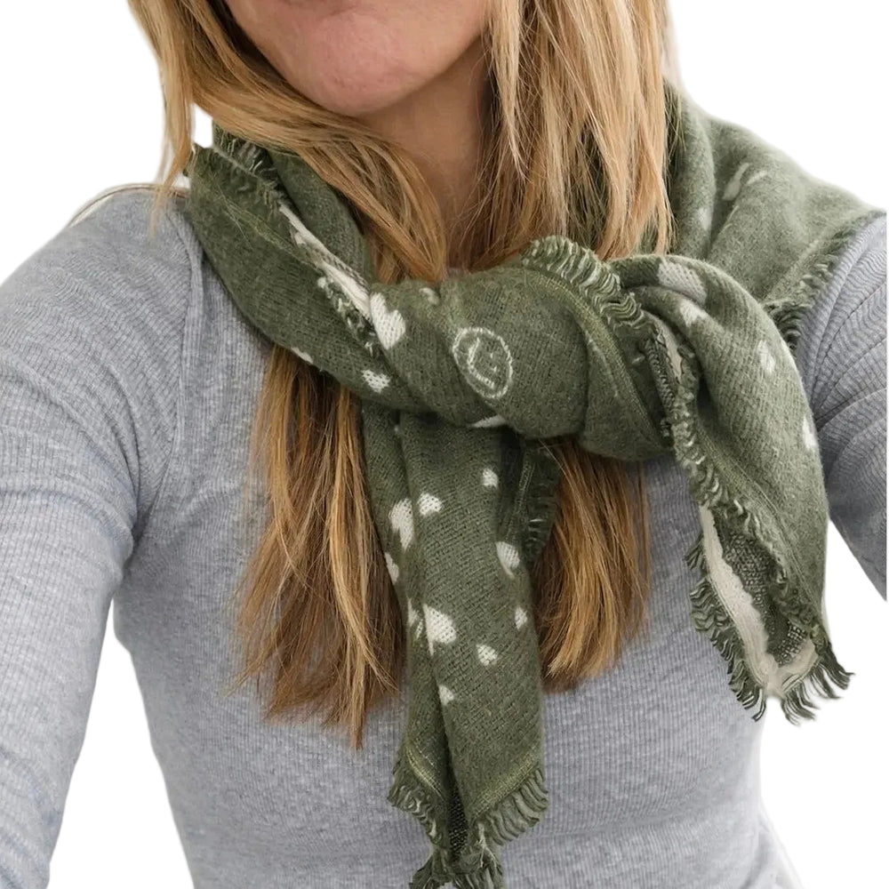Kerri Rosenthal olive heart-print bandana worn tied around the neck over a grey top