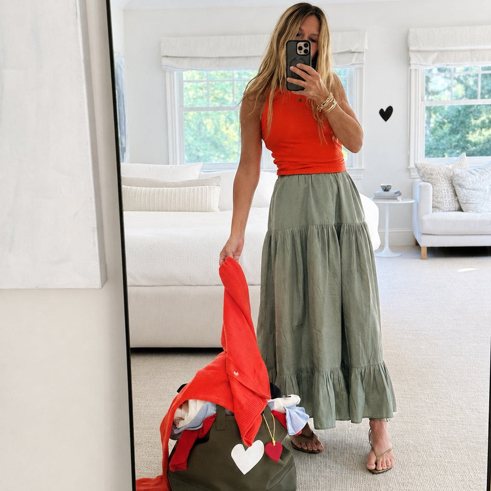 Kerri Rosenthal ribbed cotton blend red-orange tank top with a olive green maxi skirt. 