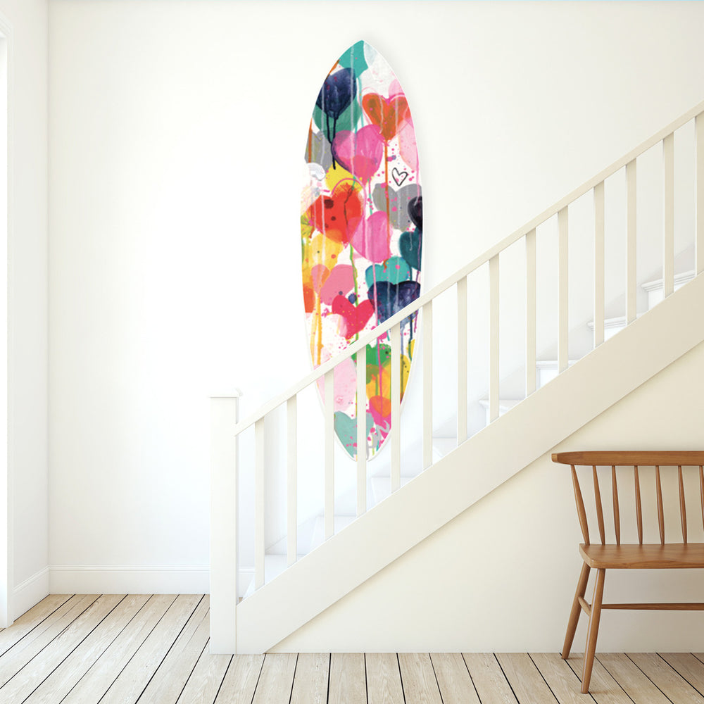 Surfboard with bold, bright Drippy Hearts pattern by Kerri Rosenthal 