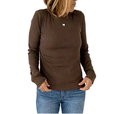Front view of brown long sleeve ribbed crewneck tee with heart detail at chest, paired with denim jeans.