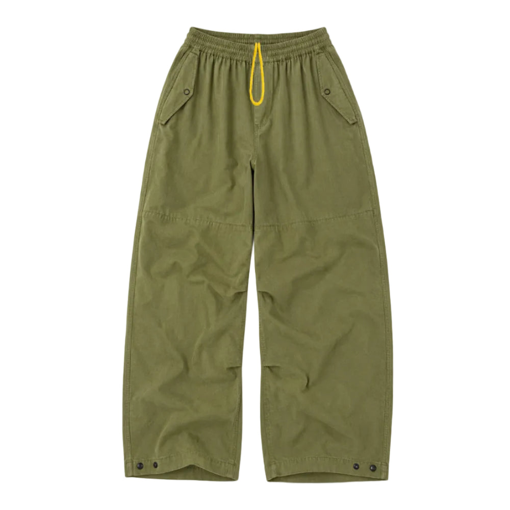 Close-up flat lay army green yellow drawstring pants. Shop women's pants at Kerri Rosenthal