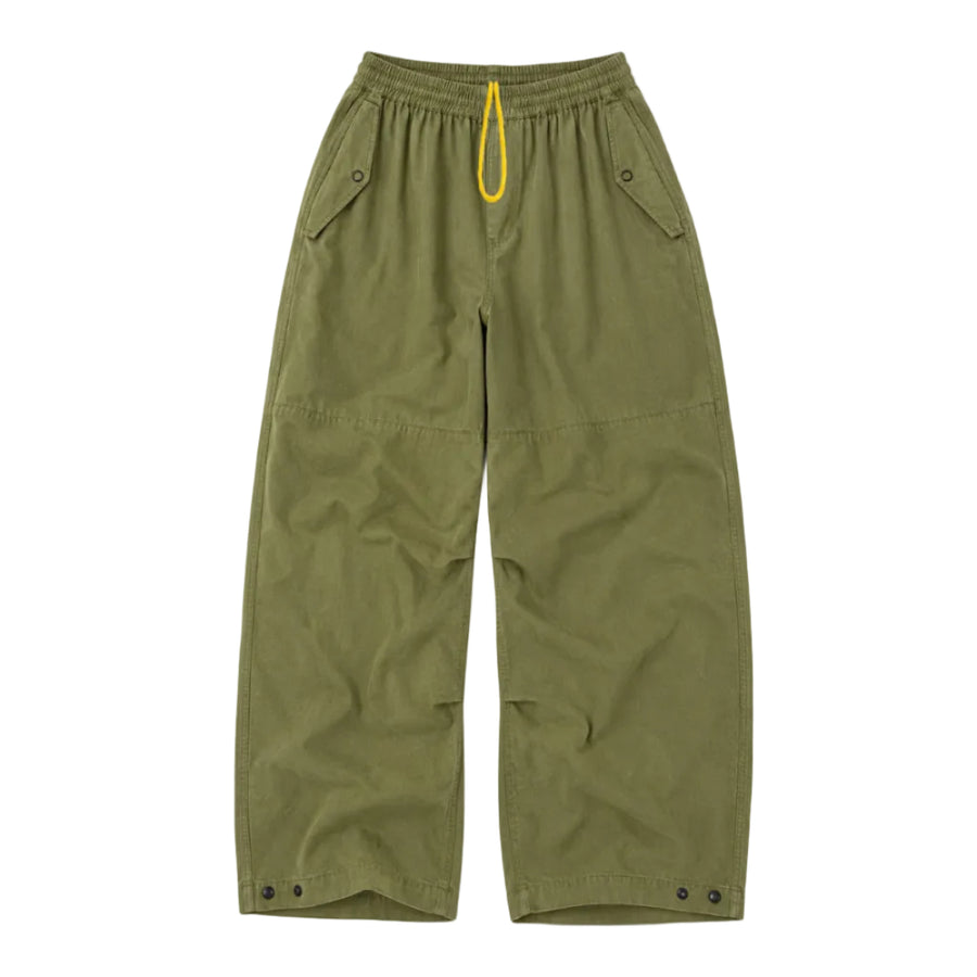Close-up flat lay army green yellow drawstring pants. Shop women's pants at Kerri Rosenthal