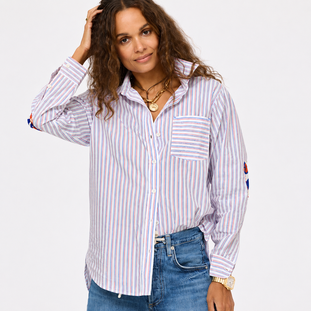 Model in Kerri Rosenthal red, white and blue stripe button down  and heart patchwork elbows with 'Love" artwork.