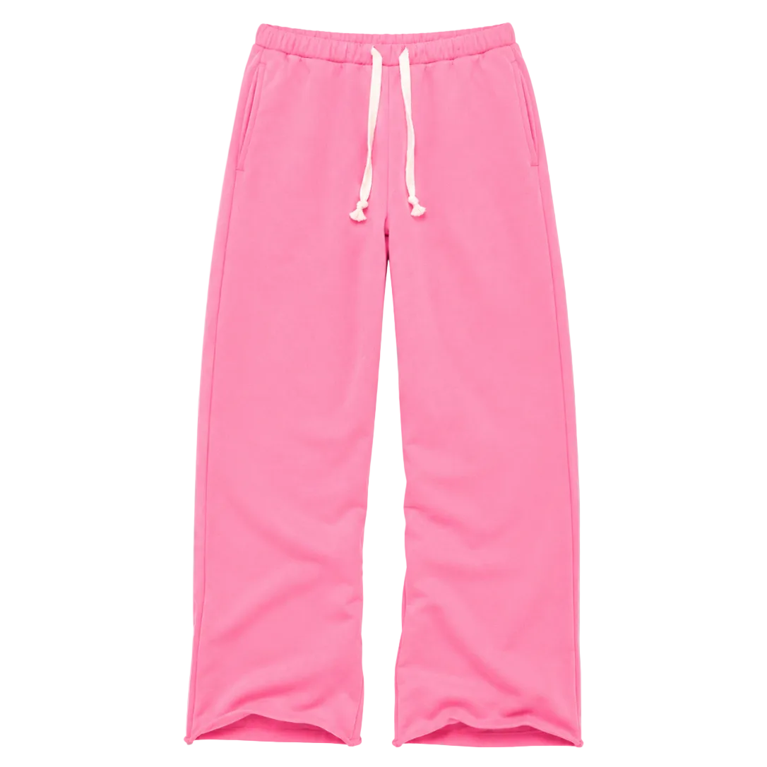 Bright pink relaxed-fit sweatpants with elastic waistband, white drawstring, and side pockets by Kerri Rosenthal
