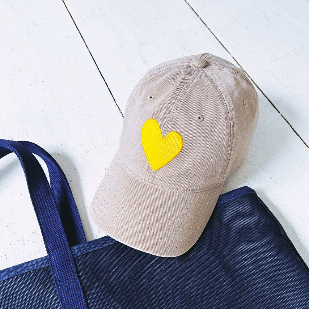 Sand khaki baseball hat sunshine yellow heart patch - cute baseball hats for women by Kerri Rosenthal