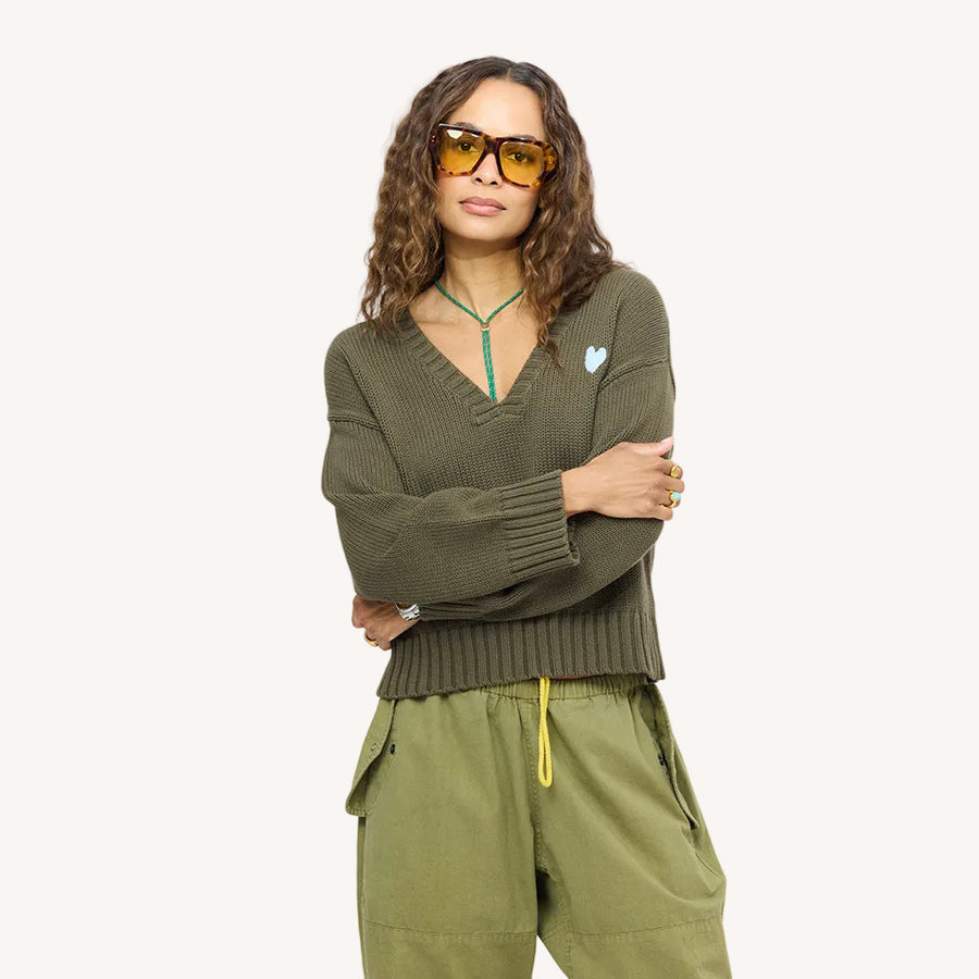 Saturday V-neck cotton knit sweater in army green with embroidered blue heart and Love Brigade army green pants - Shop women's sweaters by Kerri Rosenthal