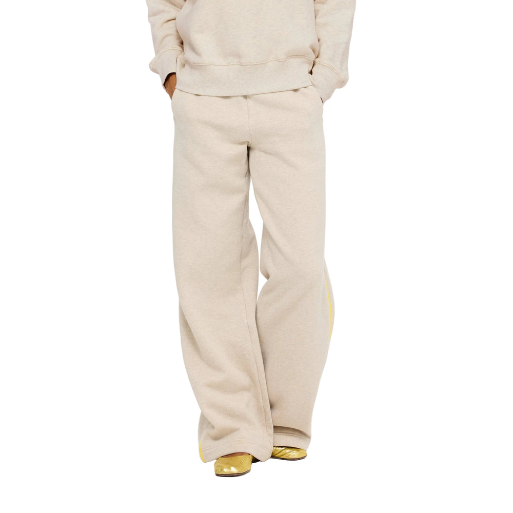Waist-down front view of the Super Soft Fleece Weekend Palazzo in taupe heather with a yellow side stripe