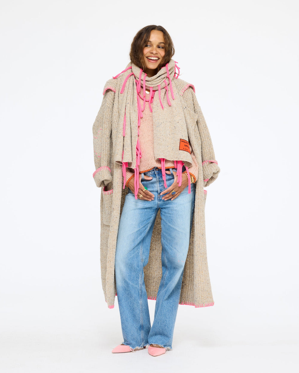 Model wearing the Morning Coffee Duster in oatcake open over the Patchwork Pullover Sweater in blush with the Makes You Smile Scarf and jeans, full length front view