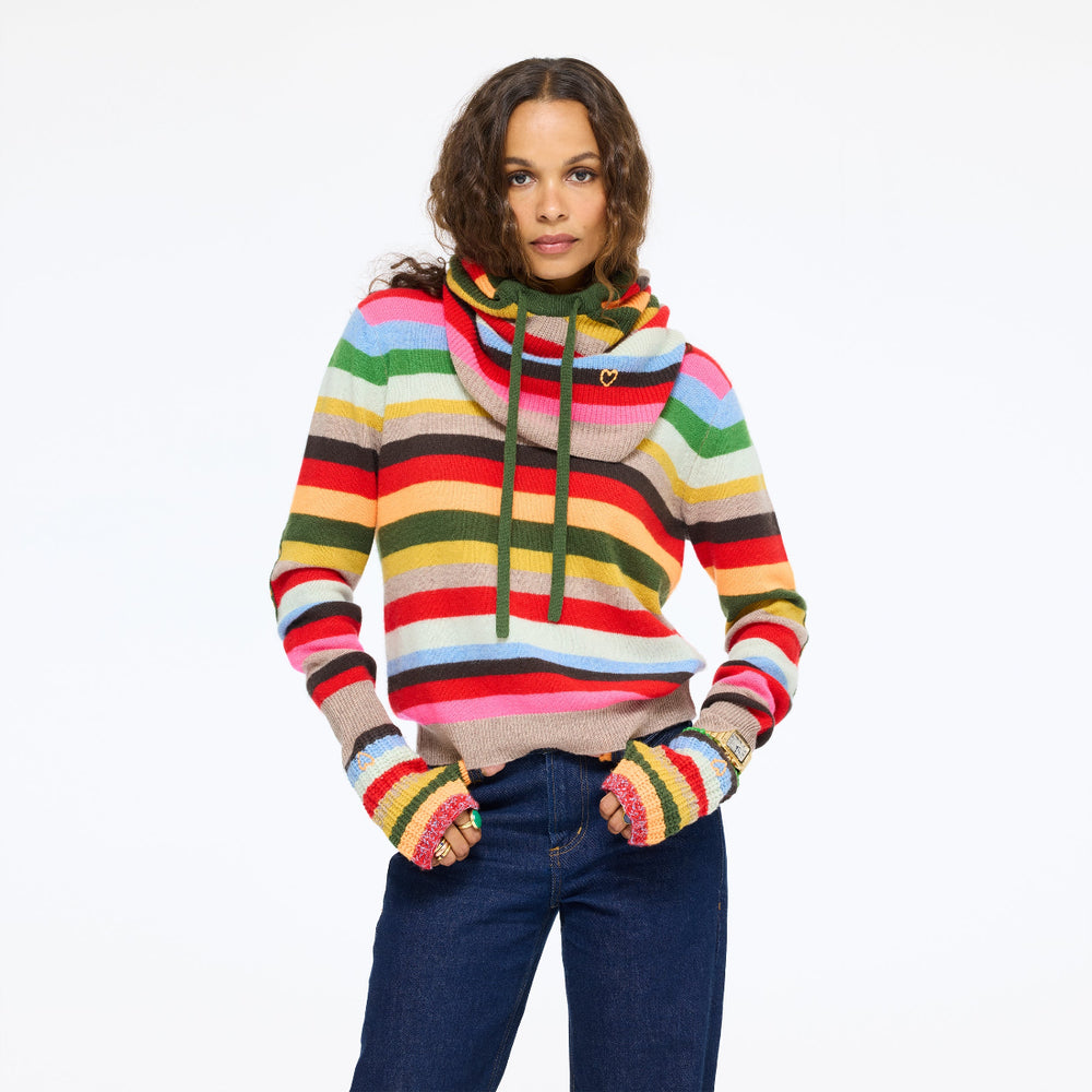 Model wearing the Patchwork Pullover Stripe Sweater in multicolor stripe with the McLuvin Hoodie hood up and jeans, front view