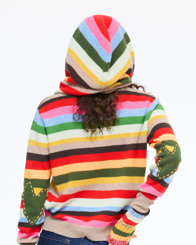 Model wearing the McLuvin Hoodie in multicolor stripe with the hood up, back view