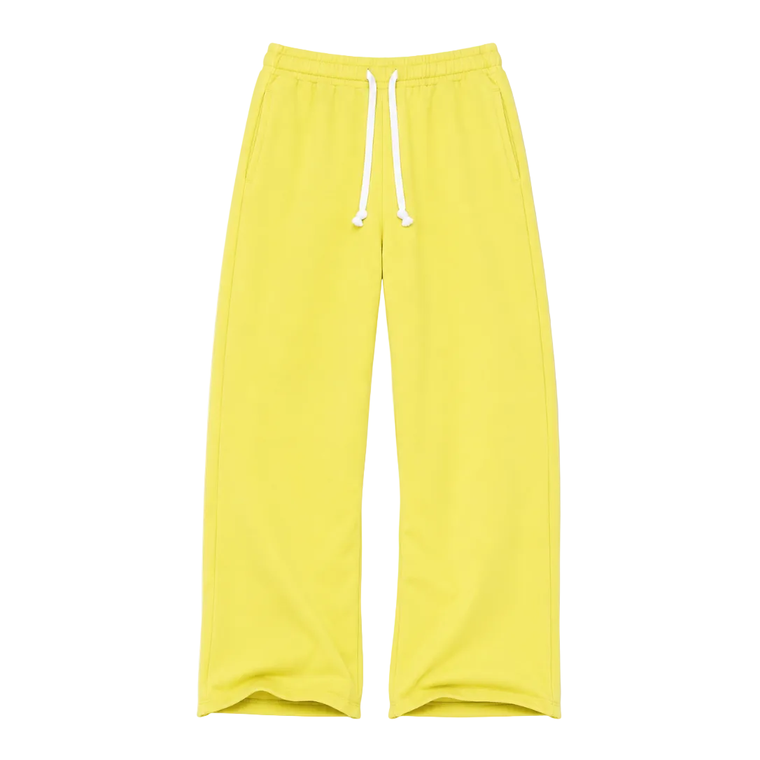 Bright yellow relaxed-fit sweatpants with elastic waistband, white drawstring, and side pockets by Kerri Rosenthal