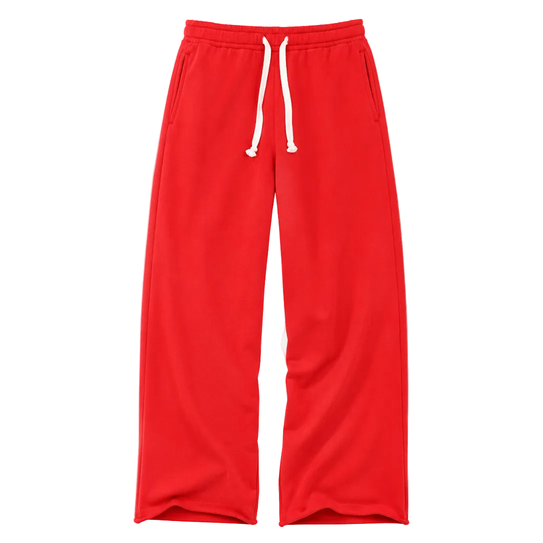 Washed red relaxed-fit sweatpants with elastic waistband, white drawstring, and side pockets by Kerri Rosenthal
