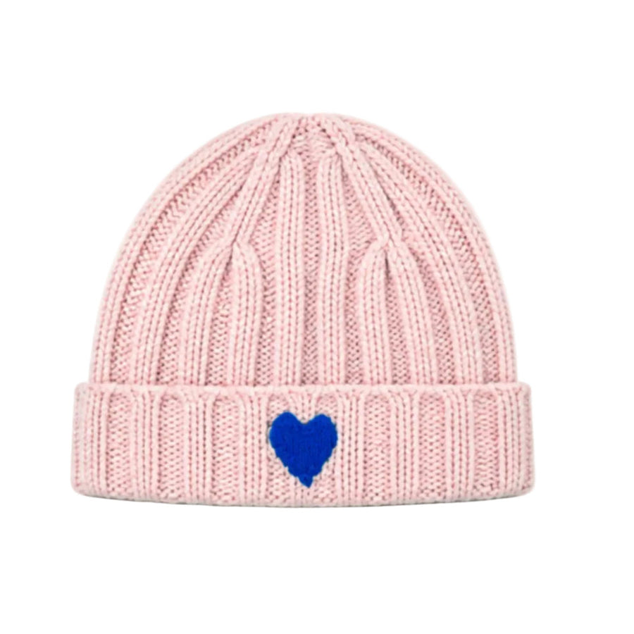 Flat view of the Winter Beanie in hardly pink with a ribbed knit, foldover brim, and a small blue heart