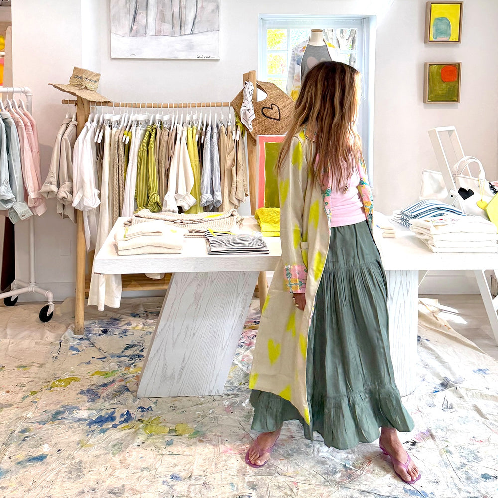 Women's cream and neon lime green heart print maxi duster coat with pink floral contrast trim with green viscose skirt