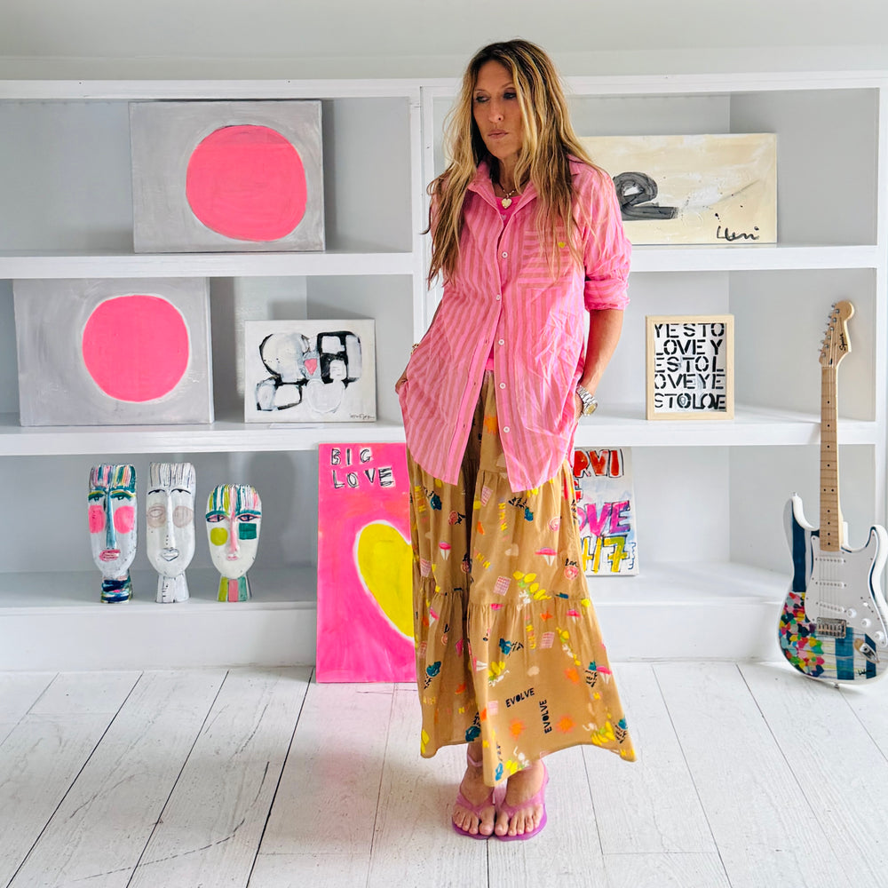 Kerri Rosenthal Point Dume tiered cotton maxi skirt in a multicolor painterly print. with palm pink Mia Stripe button down shirt.