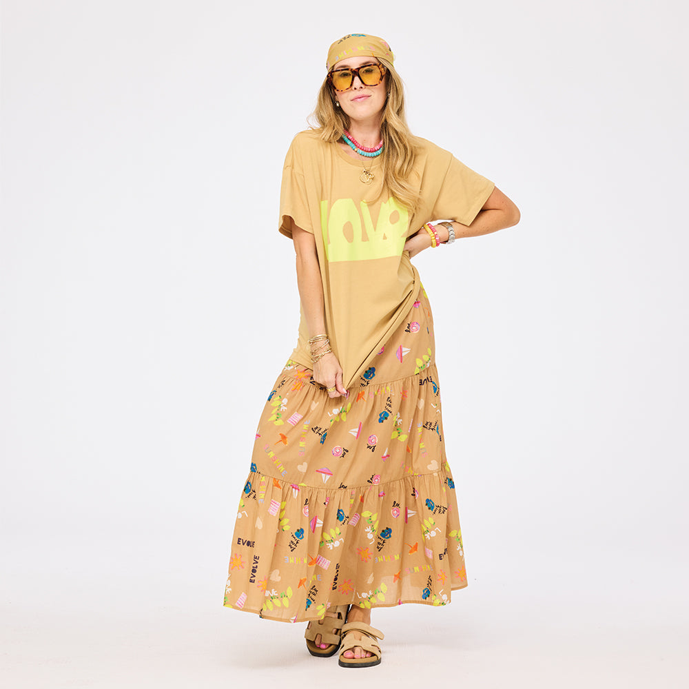 Kerri Rosenthal Point Dume tiered cotton maxi skirt in a multicolor painterly print. with graphic Love tee.