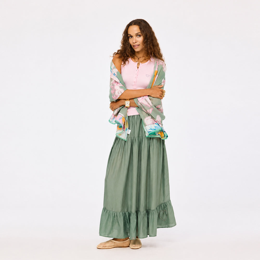 Kerri Rosenthal Dream Maxi Skirt in Amalfi green silk, tiered with a flowing hem.