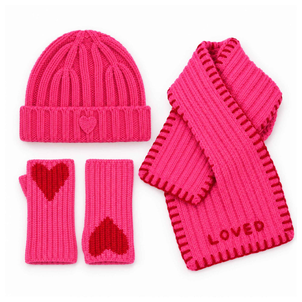 Pink ribbed cashmere hat paired with Loved Cashmere Smittens and Loved Loop Scarf