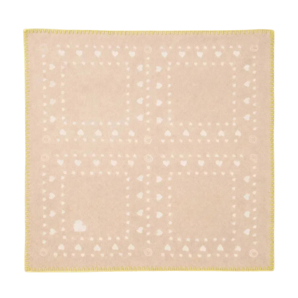 Kerri Rosenthal knit bandana scarf in Tan, flat view showing heart and dot print pattern with contrast whipstitch trim.