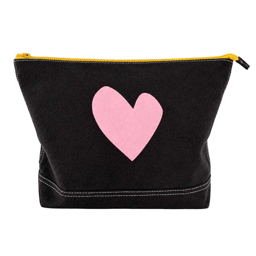 Jumbo Love Clutch in black with a large pink heart and a yellow zipper, front view