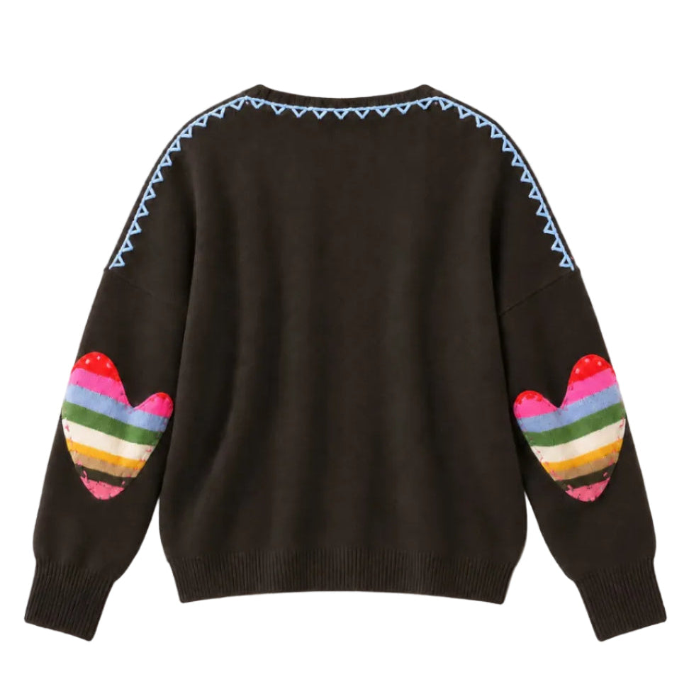 Flat view of the Frenchie Patchwork Sweater in black with multicolor striped heart elbow patches