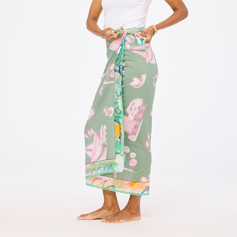 Kerri Rosenthal Toile Sarong in multicolor toile-print cotton poplin and white henley tank.