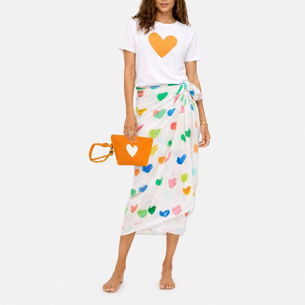 Suke Imperfect white heart t shirt in 100% cotton with sarong skirt  and orange pouch. Shop women's cute graphic tees by Kerri Rosenthal