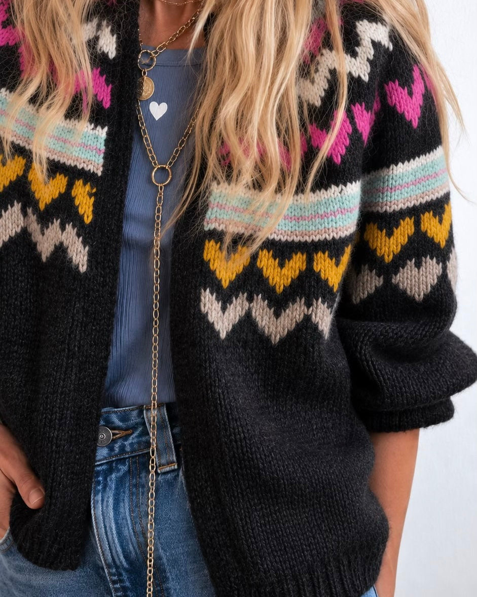 Close-up of the fair isle pattern in pink, yellow, and cream on the yoke of the Sienna Ker-Isle Cardigan