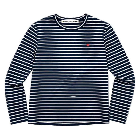 Flat lay of a Kerri Rosenthal navy and white striped long sleeve crewneck top with a small red embroidered heart on the chest.