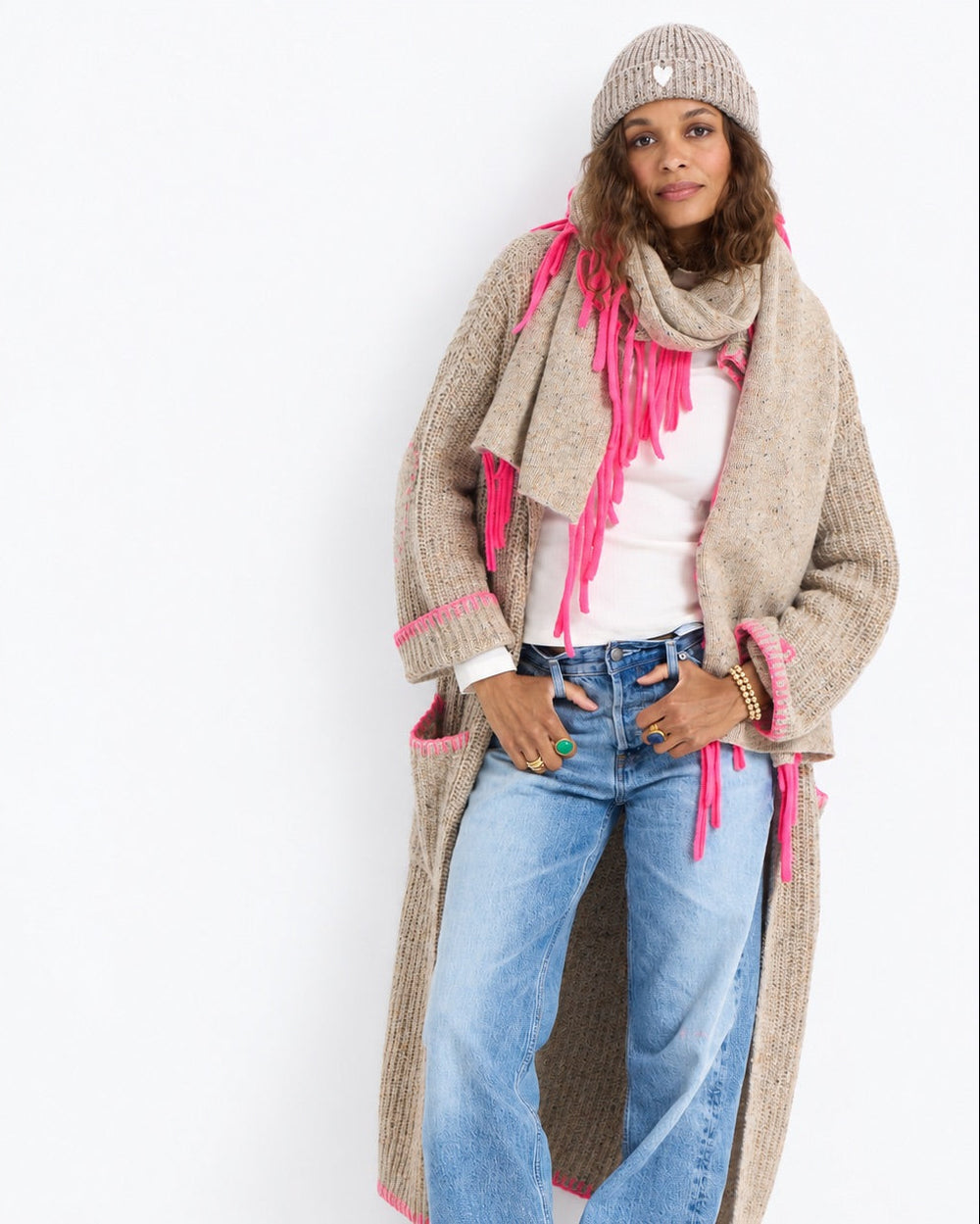 Model wearing the Morning Coffee Duster in oatcake with the Makes You Smile Scarf, the Winter Beanie in oatcake, and jeans, full length front view